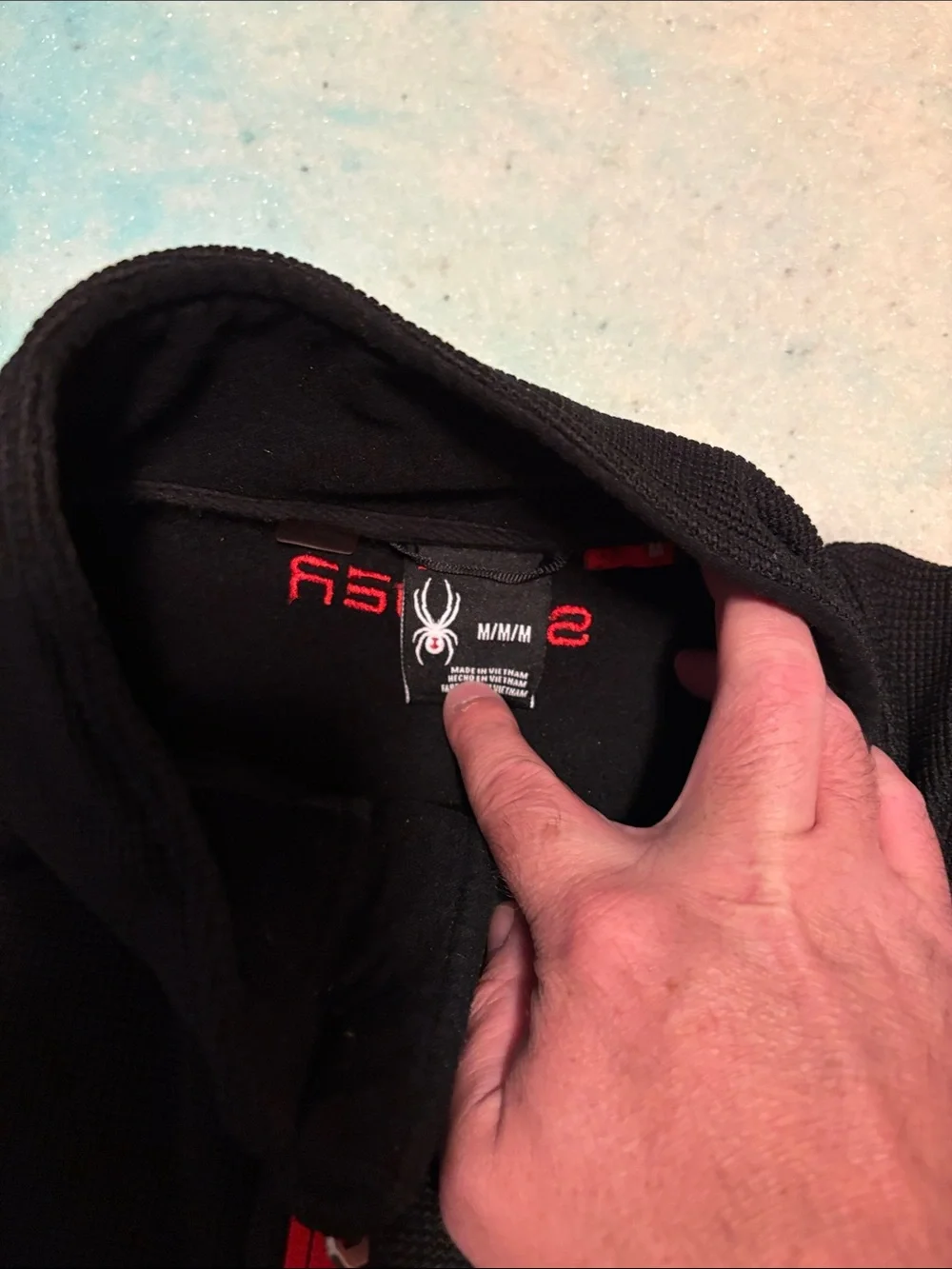 Spyder Men’s Black Half-Zip Sweater with Red Trim